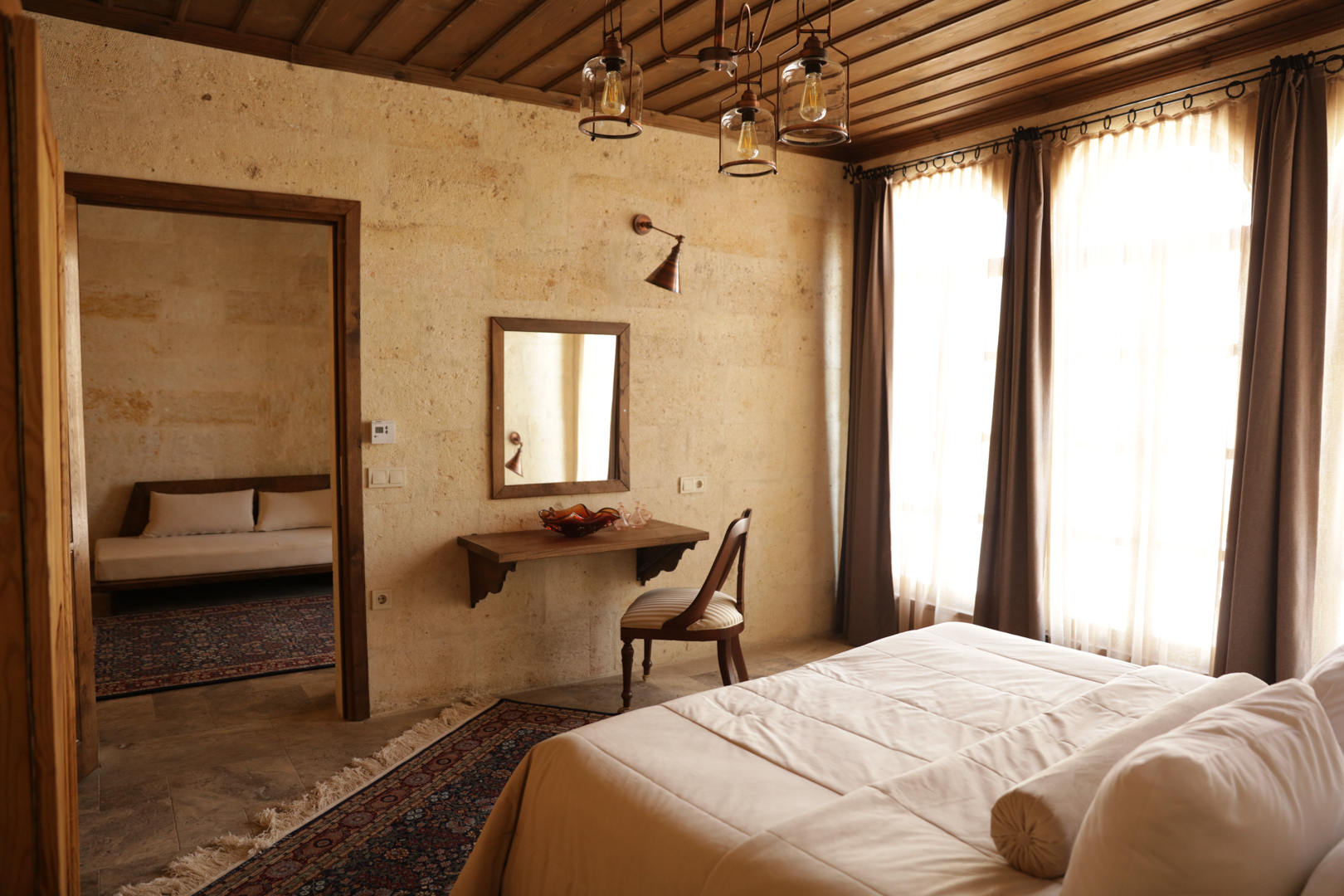 Aya Kapadokya cave suite bedroom interior